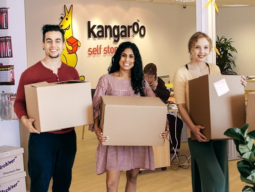 students at kangaroo self storage holding boxes